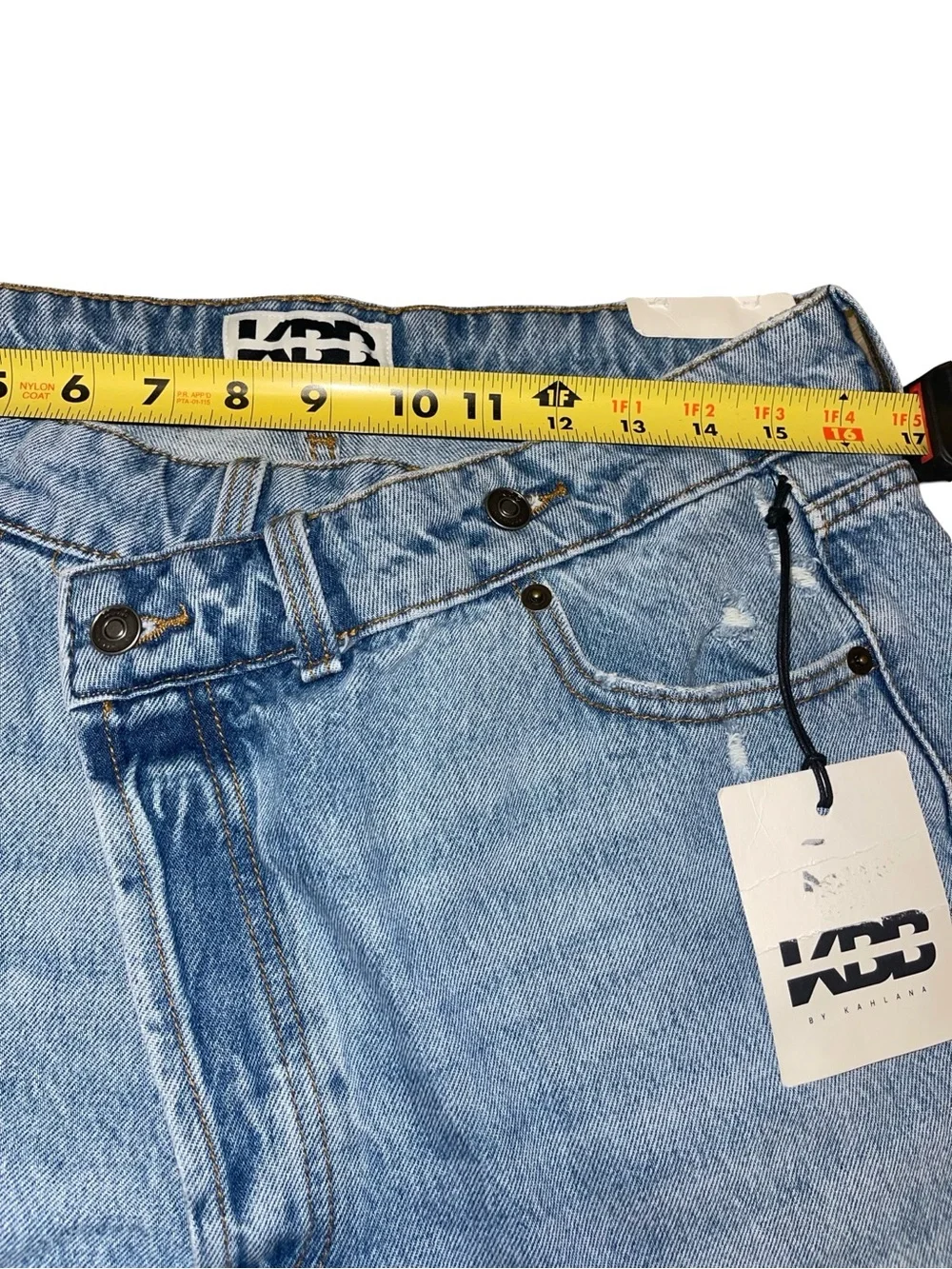 NWT KBB by KAHLANA The Dylan Jean Crossover Asymmetric Waist Light Wash